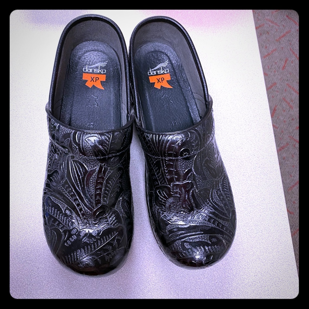 Dansko nurse clog. Like new. Worn once.